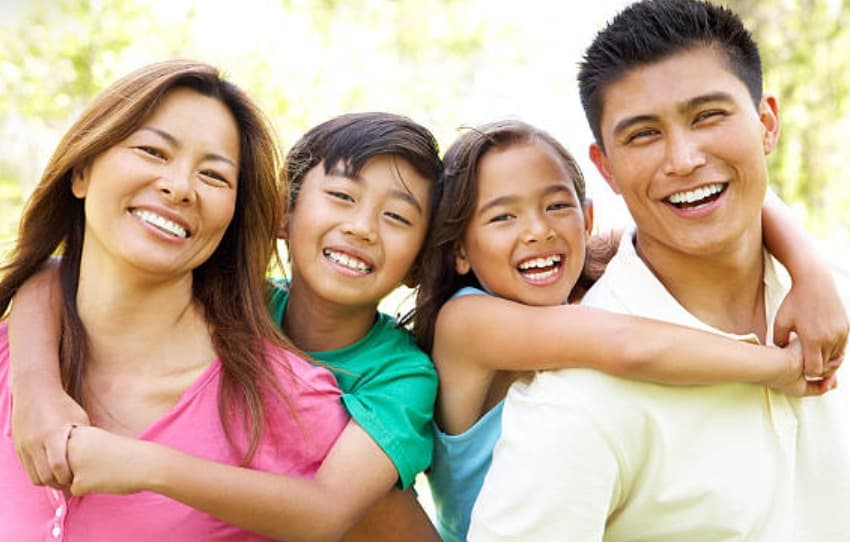 Happy family using telemedicine