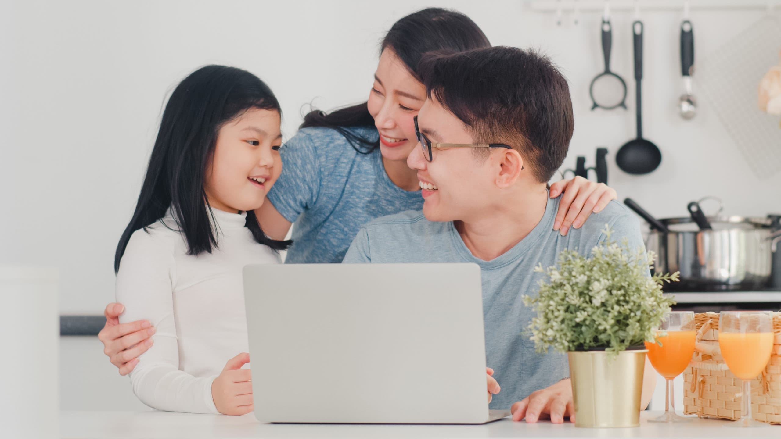 Asian family enjoying healthcare access from home